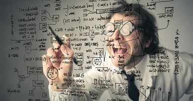 What is the difference between data and information in business?