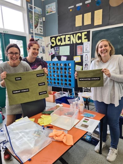 Perceptive team putting together a science kit about cows and the dairy industry